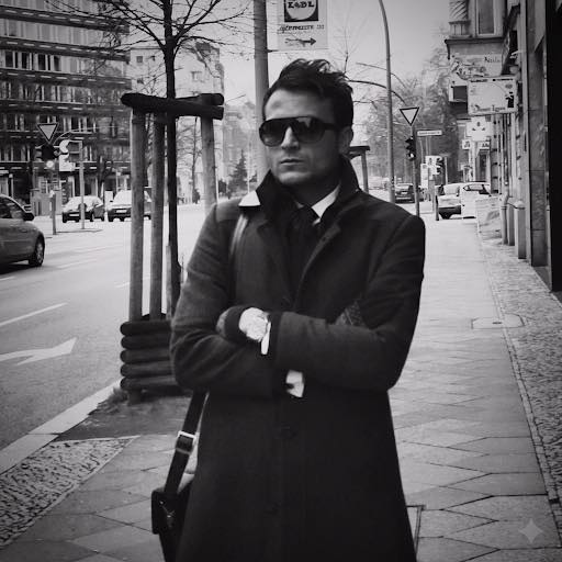 Thompey Faiz, founder of AKHA Studio, photographed on a city street